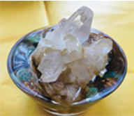 Image of a orgonite made with a Quartz point.